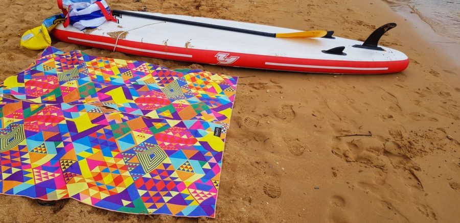 RaftTrek Towel On A Sandy Beach
