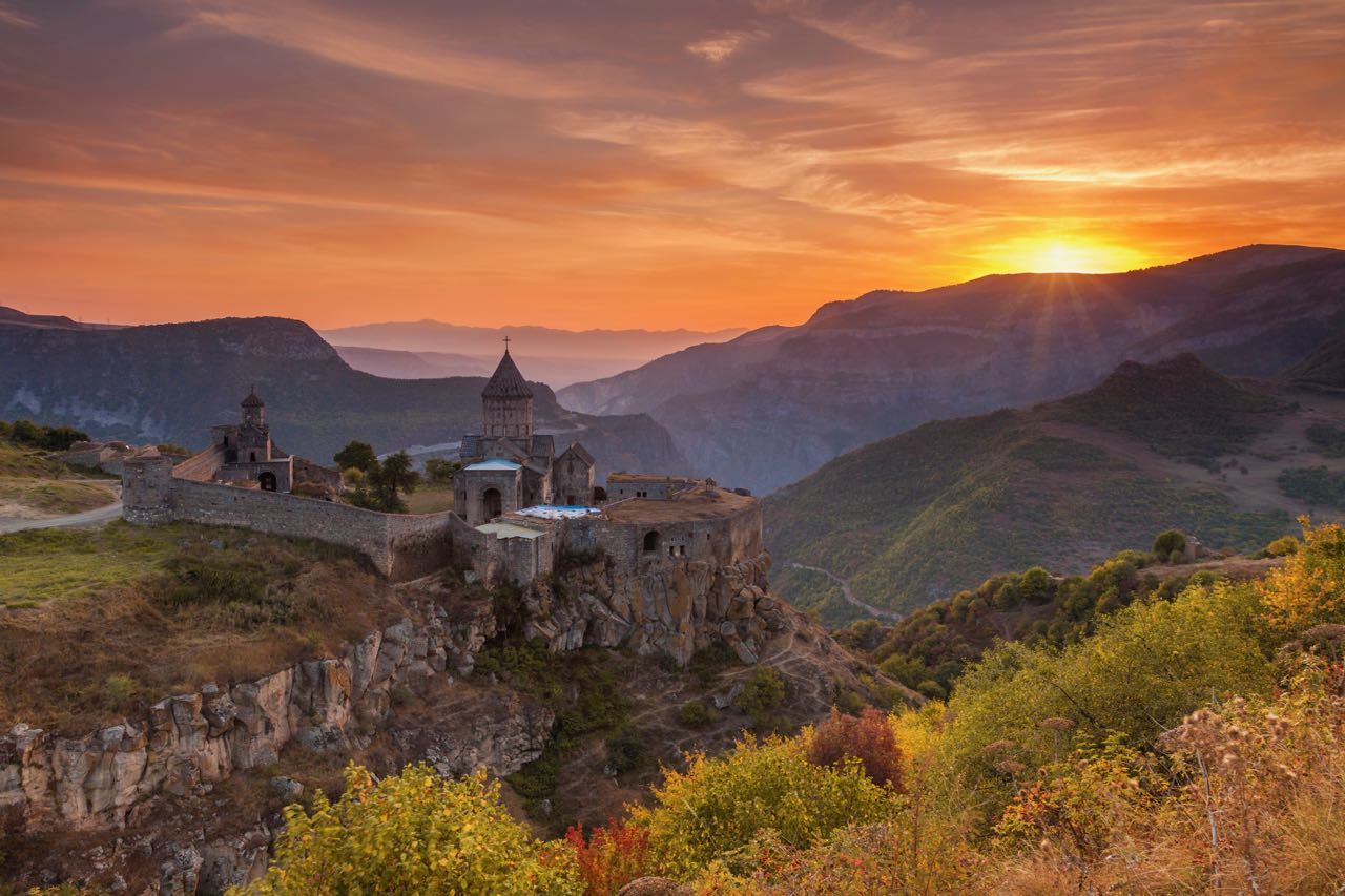 The ancient monastery in the setting sun. Tatev. Armenia.