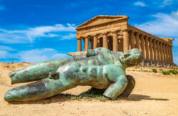 Planning A Trip To Greece - Temple of Concordia and the statue of Fallen Icarus, in the Valley of the temples
