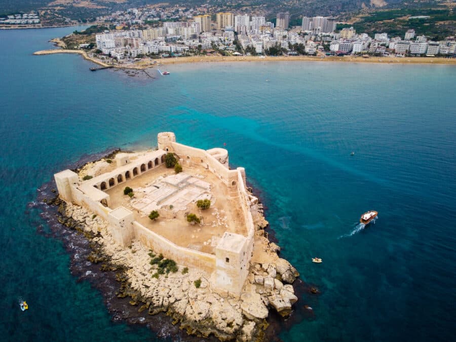 Best Island Of Turkey - Ancient fortress named Kizkalesi or Maiden Castle at mediterranean island aerial view. Kizkalesi, Mersin province, Turkey