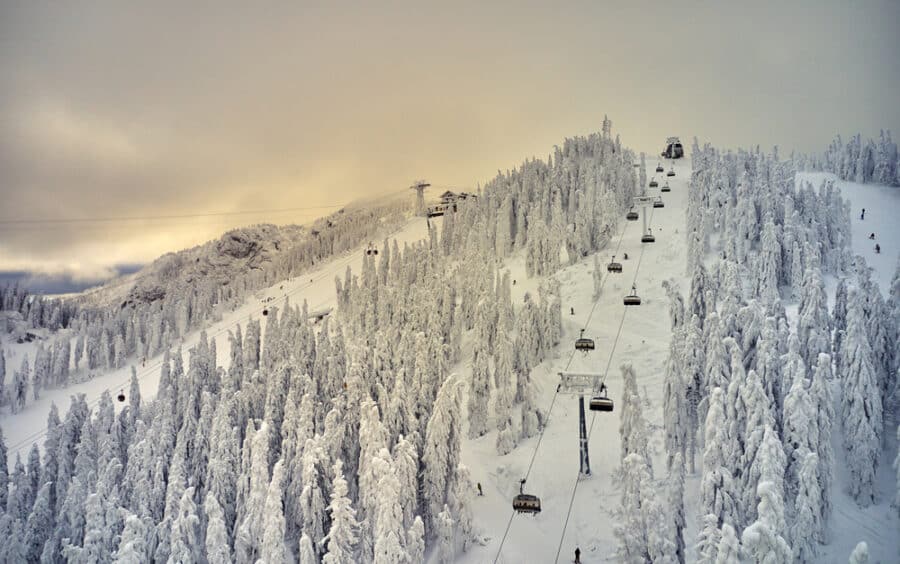 Winter in Romania - Aerial view over the spectacular ski slopes in the Carpathian Mountains