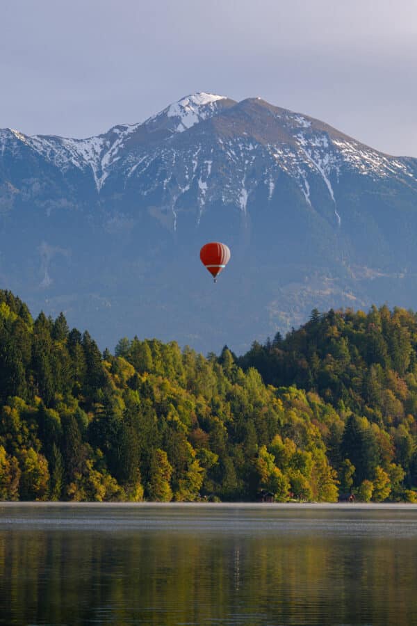 on floating over lake with mountains on the background. Lake Bled, Slovenia