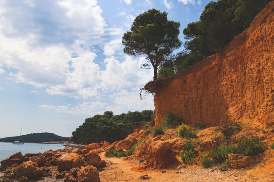 Beautiful, naturally created red sand beaches at Vrgada island