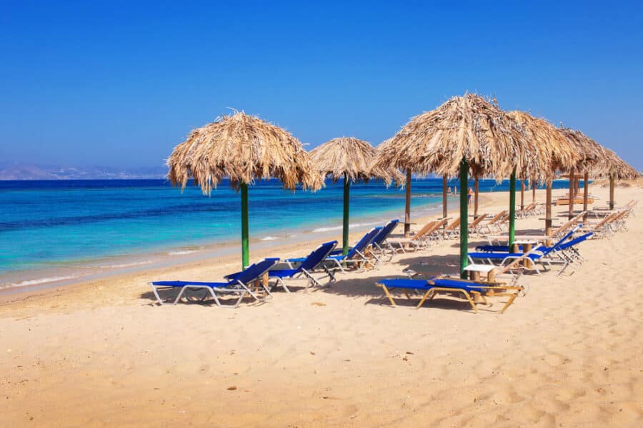 Sandy Beaches in Greece - Sunbeds on Plaka beach, Naxos island, Greece
