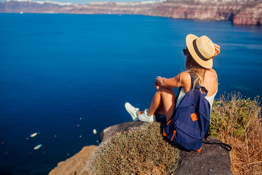 Sitting in Akrotiri Santorini overlooking the Caldera