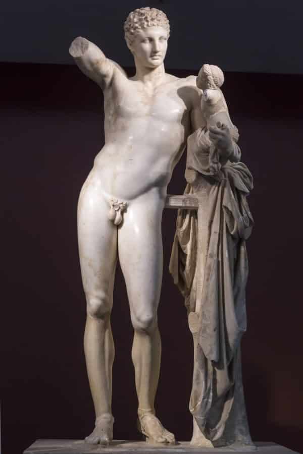 Famous Greek Statues - Hermes and Dionysus, ancient classical Greek statue of Hermes of Praxiteles (museum of ancient Olympia, Greece)