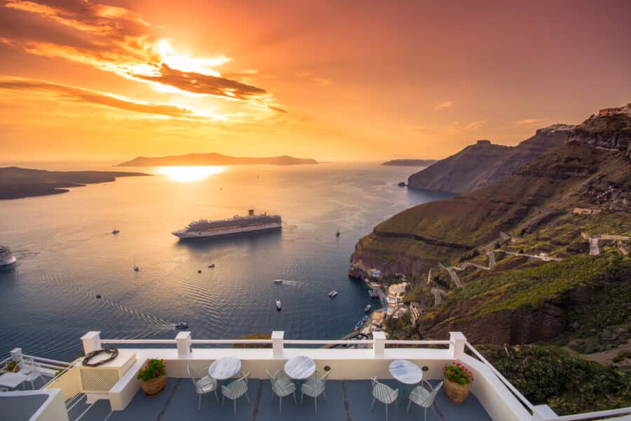 Ports in Greece - Amazing evening view of Fira, caldera, volcano of Santorini