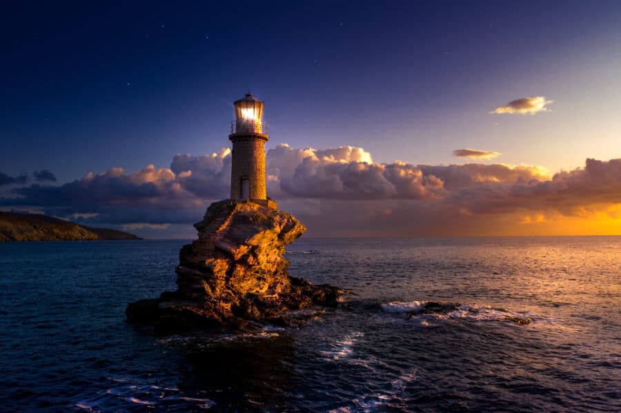 The beautiful Lighthouse Tourlitis of Chora at night. Andros island