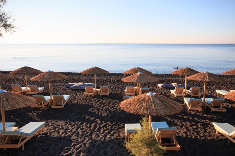 Best beaches in Santorini - Kamari beach at dawn