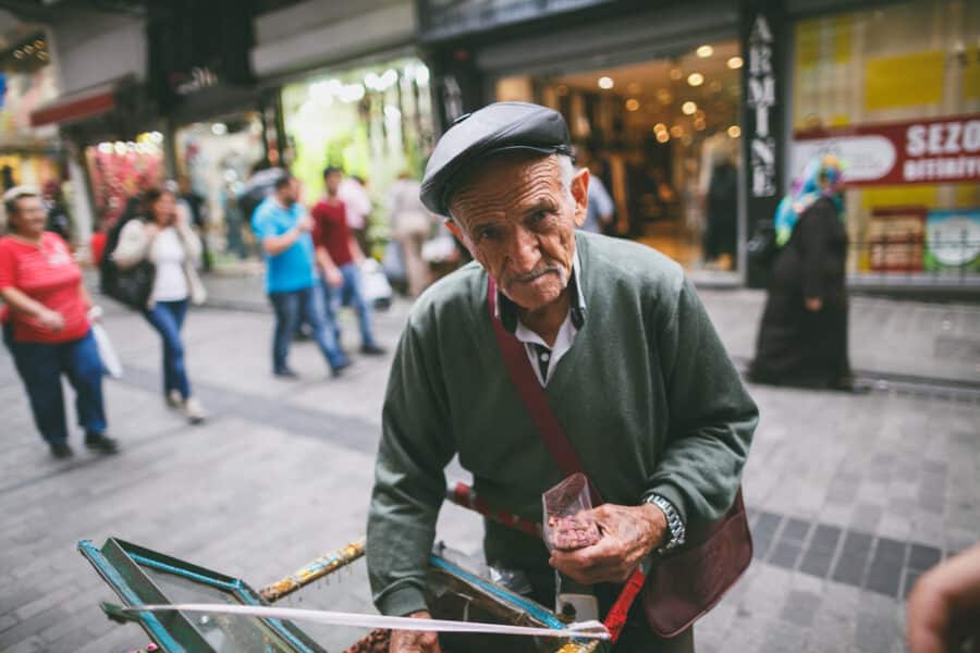 Old man selling sweets on the street in Istanbul_Turkey