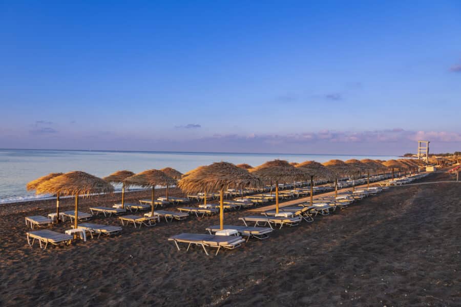 Perivolos beach on Santorini island in Greece at sunrise