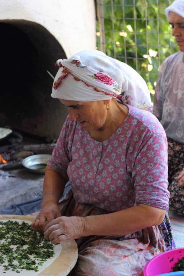 Lady making Gozleme in Turkey - Turkish Breakfast