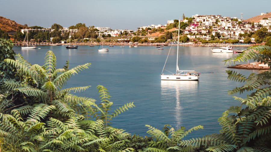 Best beaches in Bodrum - Yacht in Aspat Bay, front view. Bodrum, Turkey